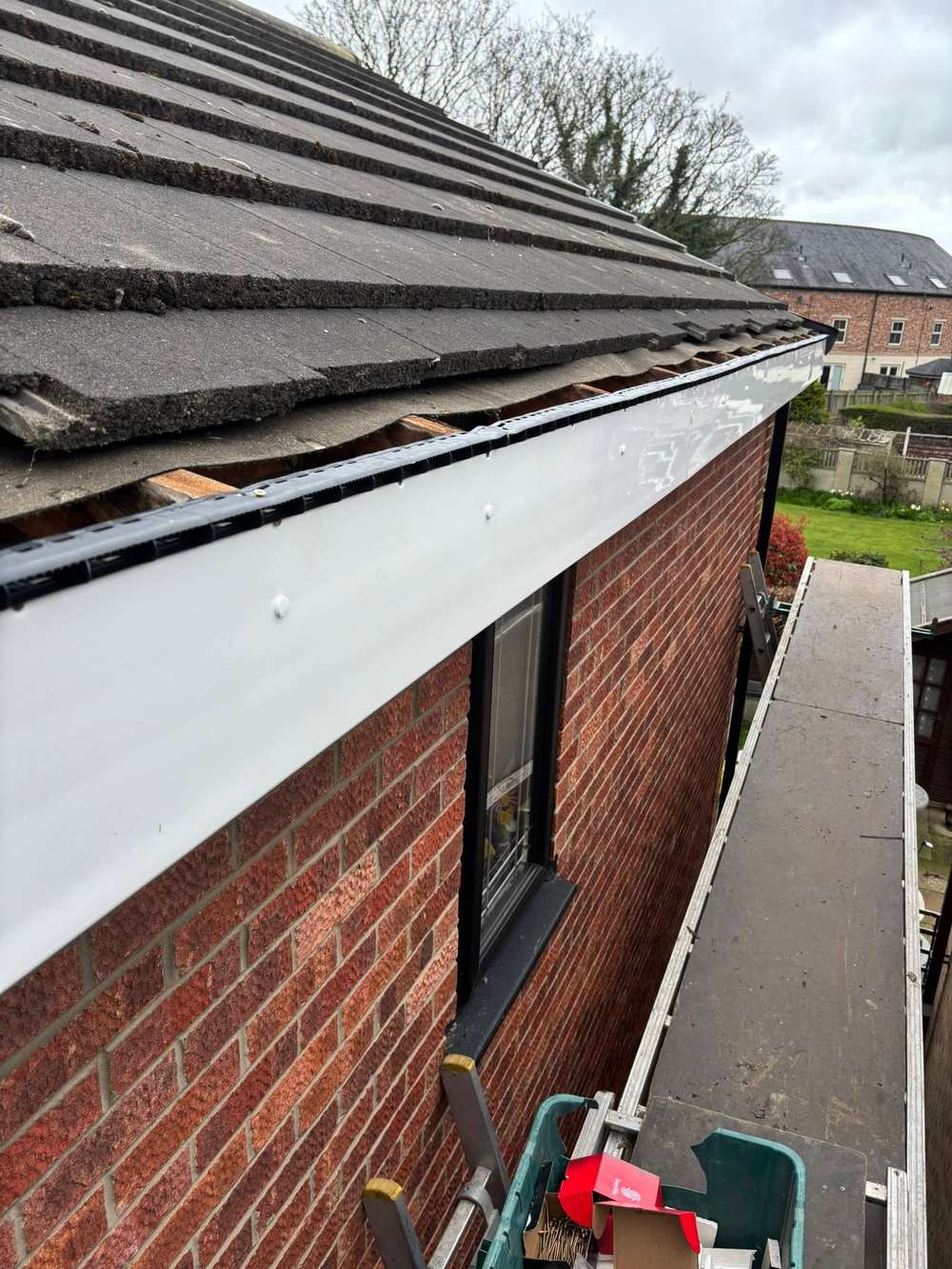 The same wall with a new white fascia