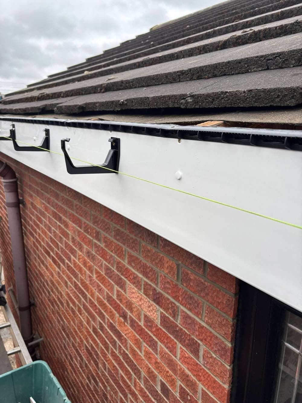 The string line running the length of the new fascia